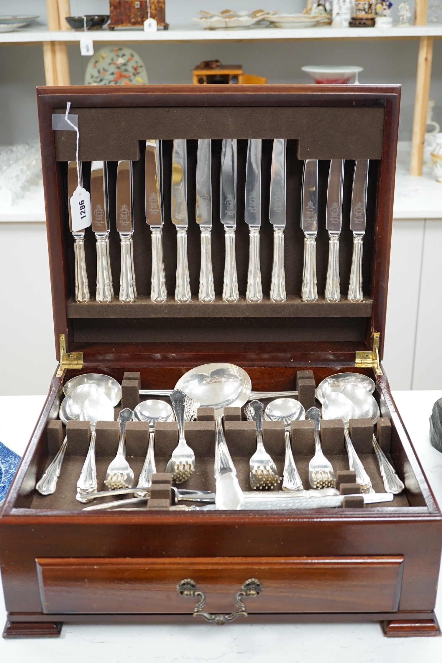 A silver plated two tier canteen of cutlery